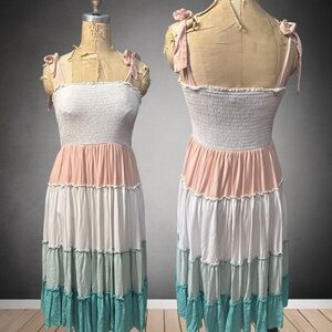 Elegant Tiered Dress in Pink, White, and Teal